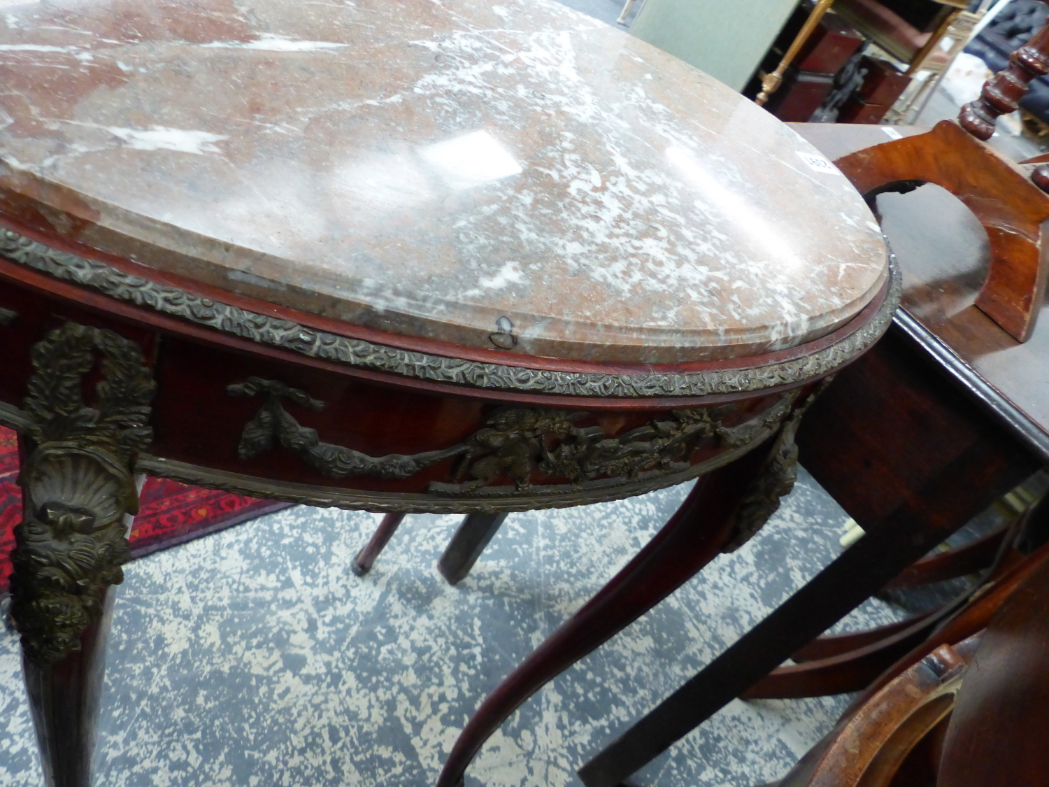 A FRENCH OVAL MARBLE TOP TABLE WITH ORMOLU MOUNTS AND FITTED DRAWER. 58 x 38cms. - Image 6 of 6