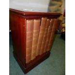 A MAHOGANY MUSIC CABINET, THE FRONT WITH SIX LEATHER BOOK SPINES LABELLED FOR TYPES OF MUSIC, EACH