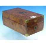A 19th.C.BRASS EDGED BURL WOOD DRESSING BOX, THE INTERIOR COMPARTMENTS LINED IN RED AND GREEN SCRIM,