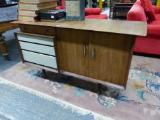 A BEAUTILITY RETRO SIDEBOARD WITH UNUSUAL DRAWER AND CUPBOARD ARRANGEMENT. H. 82 x W. 144 x D.