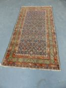 AN ANTIQUE PERSIAN FEREGHAN RUG. 284 x 142cms.