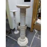 TWO ANTIQUE CARVED MARBLE PEDESTALS, EACH COMPOSED OF TURNED AND CARVED SECTIONS, WITH OCTAGONAL