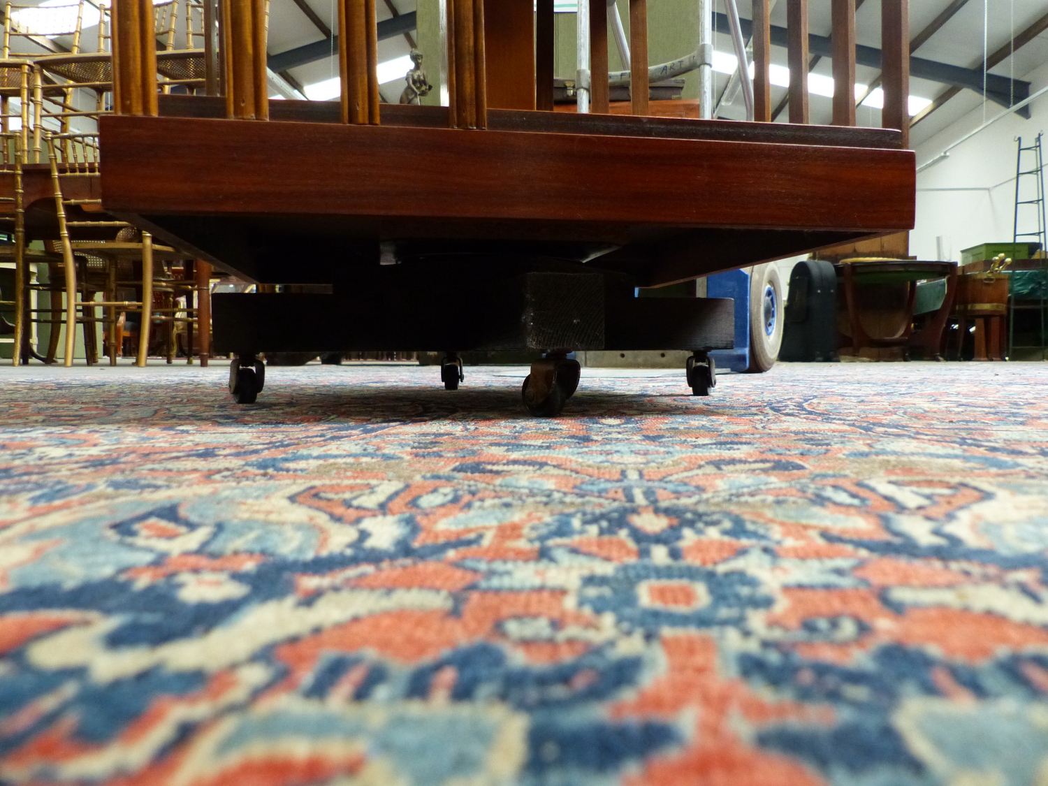 AN EDWARDIAN STYLE MAHOGANY AND INLAID SMALL REVOLVING BOOKCASE. 48 x 48 x H.79cms. - Image 4 of 4