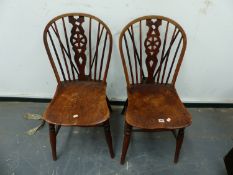 A PAIR OF ANTIQUE WHEELBACK WINDSOR CHAIRS.