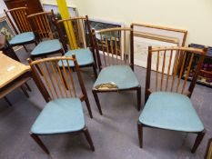 A SET OF SIX RETRO MID 20th C. ROSEWOOD CHAIRS, THE TOP RAILS AND STICK BACKS OF PALER WOOD, THE