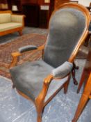 A PAIR OF FRENCH WALNUT SHOW FRAME OPEN ARM SALON CHAIRS ON SHAPED FORELEGS.