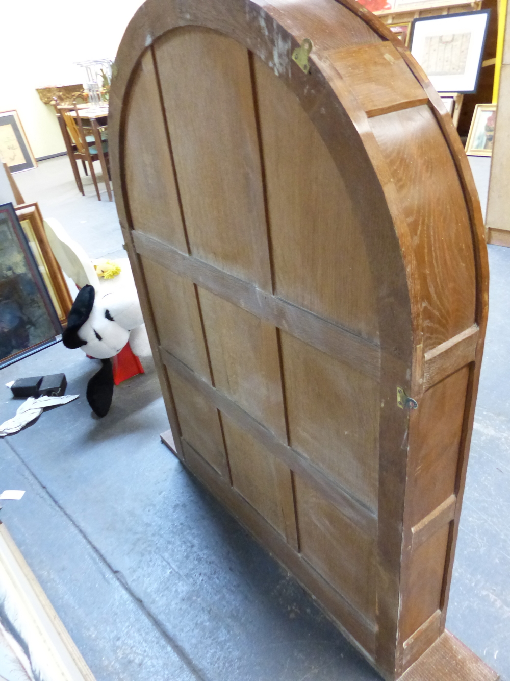 AN ARTS AND CRAFTS ACORN MAN OAK PANEL BACK ARCHED TOP BOOKCASE WITH ADZE FINISH. W.93 x D.17 x H. - Image 9 of 14