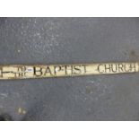 A BLACK PAINTED WHITE GROUND SIGN TO THE BAPTIST CHURCH. W 112cms.