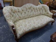 A VICTORIAN WALNUT SHOW FRAME AND BUTTON UPHOLSTERED LARGE SALON SETTEE. W.190cms.