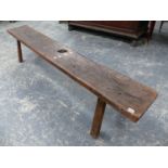 AN ANTIQUE RUSTIC OAK LONG BENCH ON SQUARE PEG LEGS. L.234 x H.46cms