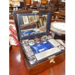 A WALNUT CASED SILVER ON COPPER FITTED DRESSING AND JEWELLERY BOX, A BLUE VELVET LINED LIFT OUT TRAY