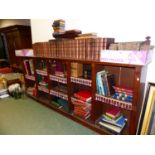 A LATE VICTORIAN WALNUT OPEN FRONT BOOKCASE WITH RAISED BACK AND ADJUSTABLE SHELVES. W.272 x D.40