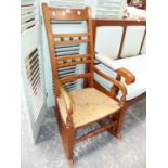 A 19th.C.RUSH SEAT LADDER BACK ROCKING CHAIR.