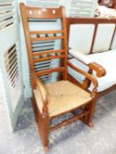 A 19th.C.RUSH SEAT LADDER BACK ROCKING CHAIR.