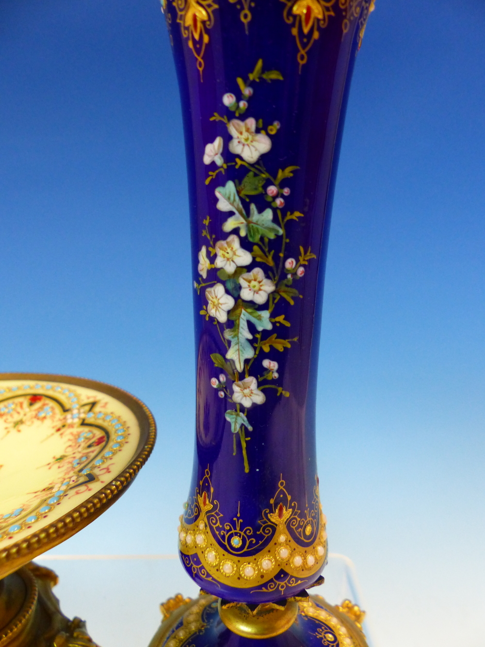 A FLORAL ENAMELLED ROYAL BLUE GROUND WAISTED CYLINDRICAL VASE ON FOUR ORMOLU FEET. H 15cms. ROGETHER - Image 4 of 14