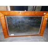 AN ANTIQUE MAPLE OVERMANTLE MIRROR. 62 x 96cms.