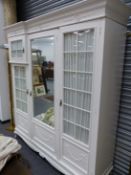 A LATE VICTORIAN PAINTED COMPACTUM WARDROBE, CABRIOLE LEGS, TOGETHER WITH A SIMILAR BEDSIDE