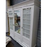 A LATE VICTORIAN PAINTED COMPACTUM WARDROBE, CABRIOLE LEGS, TOGETHER WITH A SIMILAR BEDSIDE