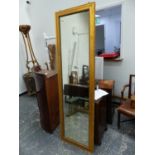 AN ANTIQUE GILT FRAMED PIER/ROBING MIRROR. W 59 x H 197cms.