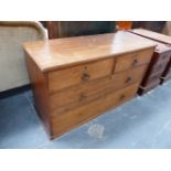 AN ANTIQUE OAK FOUR DRAWER LOW CHEST. H. 74 x W. 124 x D. 47cms.