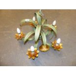 A GREEN PAINTED METAL FIVE LIGHT CHANDELIER WORKED WITH STRAPS OF LANCET TOPPED LEAVES, THE CANDLE