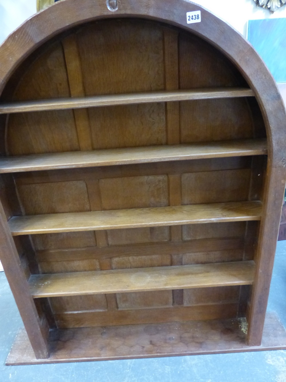 AN ARTS AND CRAFTS ACORN MAN OAK PANEL BACK ARCHED TOP BOOKCASE WITH ADZE FINISH. W.93 x D.17 x H. - Image 7 of 14