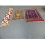 AN ANTIQUE PERSIAN TRIBAL RUG 133 x 90cms. TOGETHER WITH AN ORIENTAL RUG OF TURKOMAN DESIGN AND A