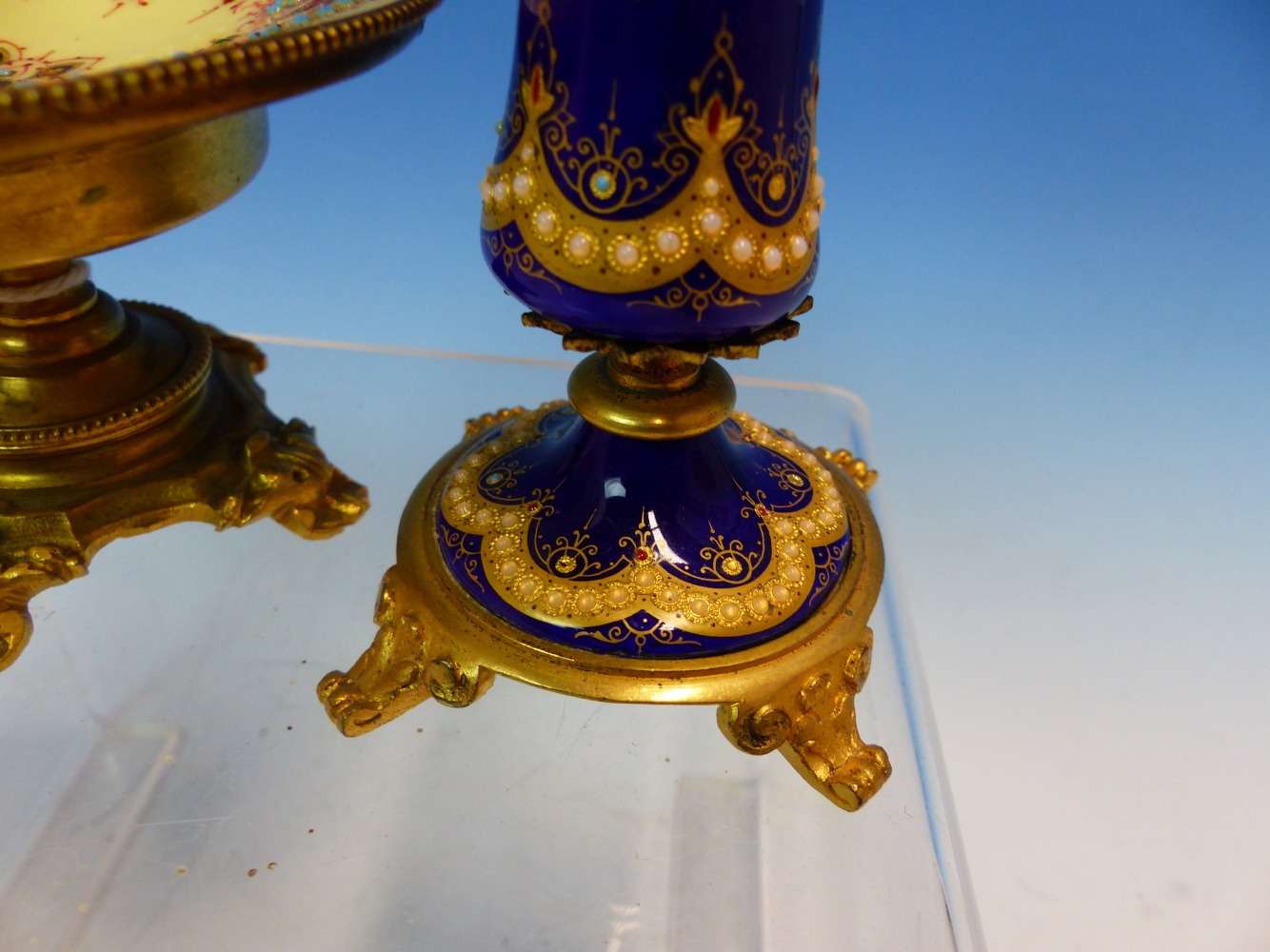 A FLORAL ENAMELLED ROYAL BLUE GROUND WAISTED CYLINDRICAL VASE ON FOUR ORMOLU FEET. H 15cms. ROGETHER - Image 6 of 14