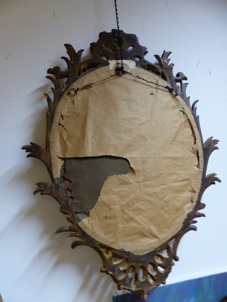 A CARVED GILTWOOD OVAL WALL MIRROR IN THE GEORGIAN TASTE. - Image 8 of 17