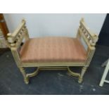 A CREAM SILK INSET GILT DRESSING TABLE IN THE FRENCH TASTE, THE INCURVED FRONT TO THE RECTANGULAR