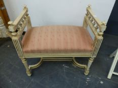 A CREAM SILK INSET GILT DRESSING TABLE IN THE FRENCH TASTE, THE INCURVED FRONT TO THE RECTANGULAR