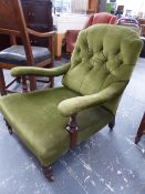 A VICTORIAN BUTTON BACK NURSING CHAIR ON TURNED FORELEGS.