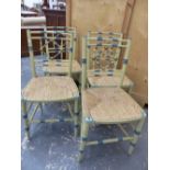 A SET OF FOUR GREEN PAINTED RUSH SEATED CHAIRS, THE SIMULATED BAMBOO BACKS DETAILED IN TURQUOISE AND