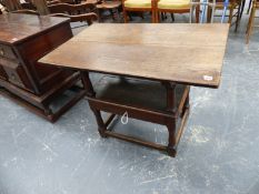 AN 18th.C.AND LATER OAK MONK'S BENCH WITH UNDERSEAT DRAWER, TURNED LEGS AND BOX STRETCHER, THE TOP