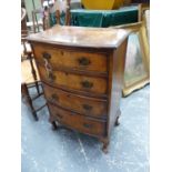 A SMALL GEORGIAN STYLE BOW FRONT FOUR DRAWER CHEST ON SHORT CABRIOLE LEGS. W.52 x D.35 x H.77cms.