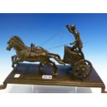 A 19th C. BRONZE GROUP OF A ROMAN CHARIOTEER DRIVING TWO HORSES, RECTANGULAR PLINTH. W 37cms.