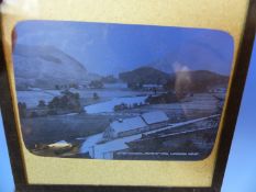 TWO BOXES OF PAPER MOUNTED GLAZED BLACK AND WHITE PHOTOGRAPHS FOR MAGIC LANTERN DISPLAY, LARGELY