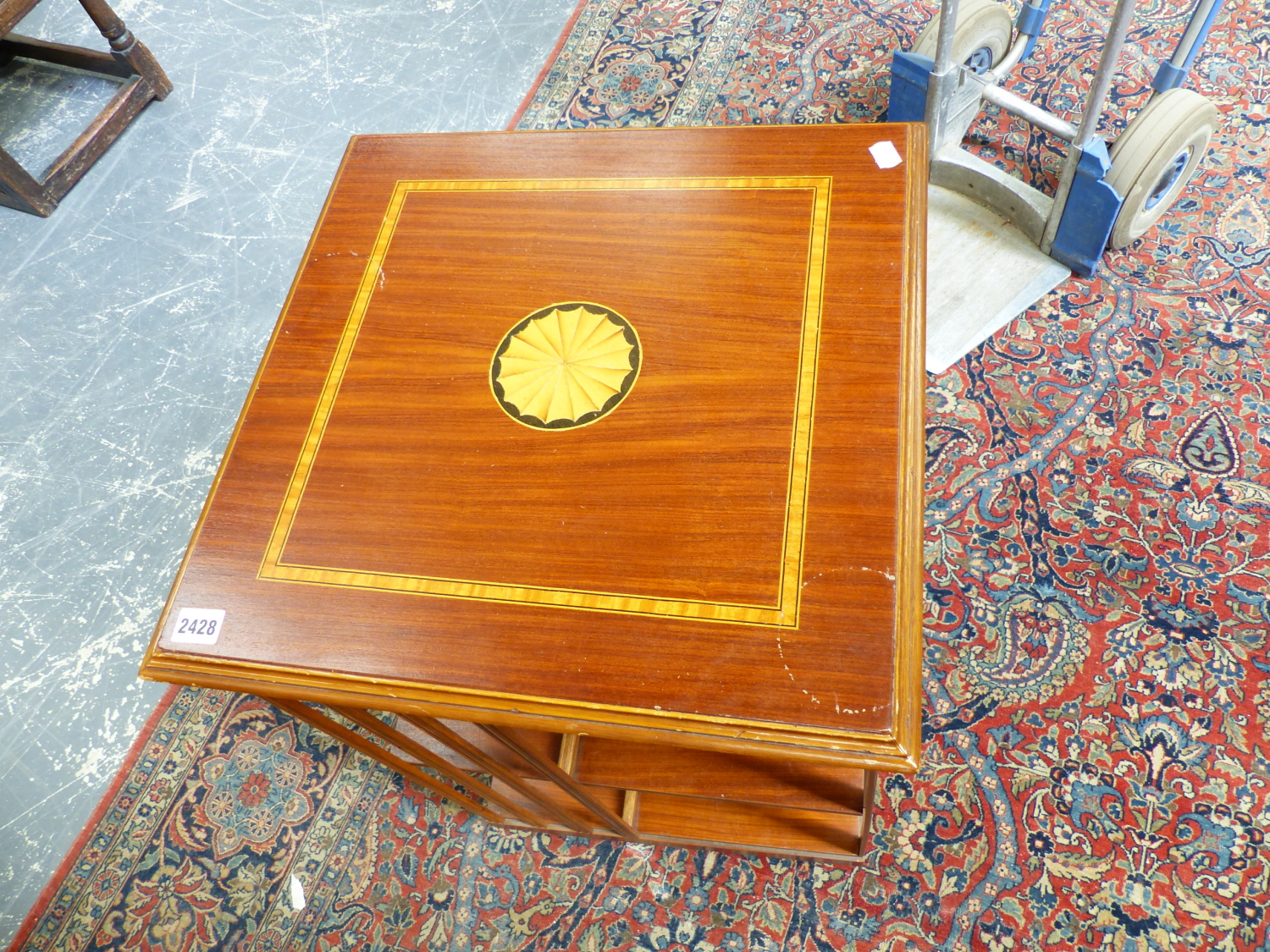 AN EDWARDIAN STYLE MAHOGANY AND INLAID SMALL REVOLVING BOOKCASE. 48 x 48 x H.79cms. - Image 3 of 4