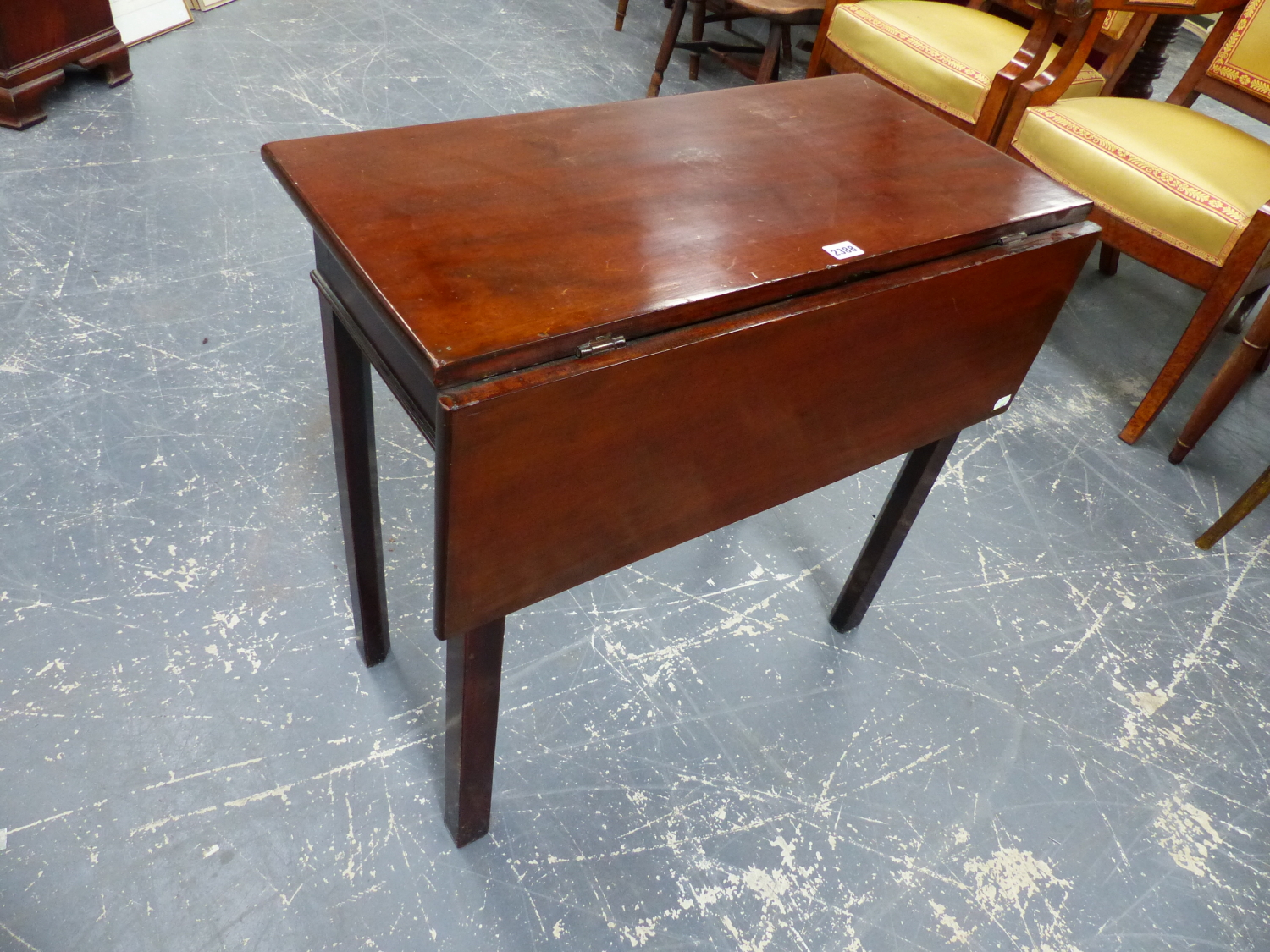 A 19th C. MAHOGANY TABLE WITH SINGLE RECTANGULAR FLAP OPENING ON SINGLE GATE, THE SQUARE SECTIONED