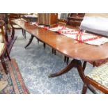 A GOOD ANTIQUE AND LATER MAHOGANY TWIN PEDESTAL DINING TABLE COMPLETE WITH ADDITIONAL LEAF. L.228