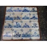 A GROUP OF 16 EARLY DELFT BLUE AND WHITE TILES INSET INTO THE TOP OF A LOW OAK COFFEE TABLE.