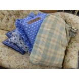 A COLLECTION OF VARIOUS BED AND FURNITURE COVERS, TOGETHER WITH ASSORTED CUSHIONS.