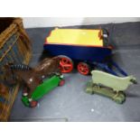 A VINTAGE PAINTED WOOD TOY HAY CART, A MODEL HORSE ON WHEELS AND A SIMILAR MODEL SHEEP.