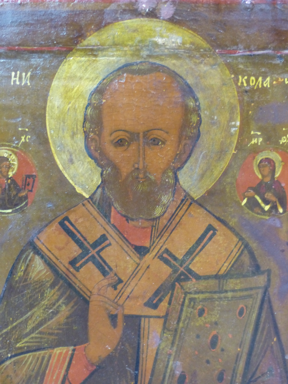 A RUSSIAN ICON PAINTED WITH ST NICHOLAS HOLDING A HOLY BOOK, ROUNDELS OF ST MARY AND JESUS ABOVE HIS - Image 2 of 9