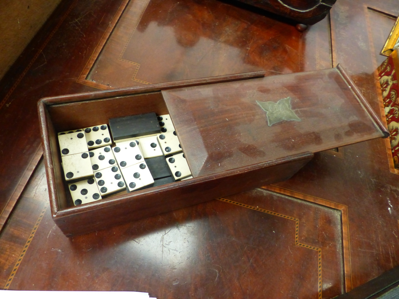 A 19th.C. MAHOGANY SLIDE TOP BOX CONTAINING DOMINOES, A RUSTIC OAK DESK STAND, A LEATHER BOUND - Image 4 of 9