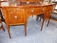 A GEORGIAN MAHOGANY BOW FRONT SIDEBOARD, THE THREE DRAWERS EDGED WITH SATIN WOOD BANDS AND WITH LION