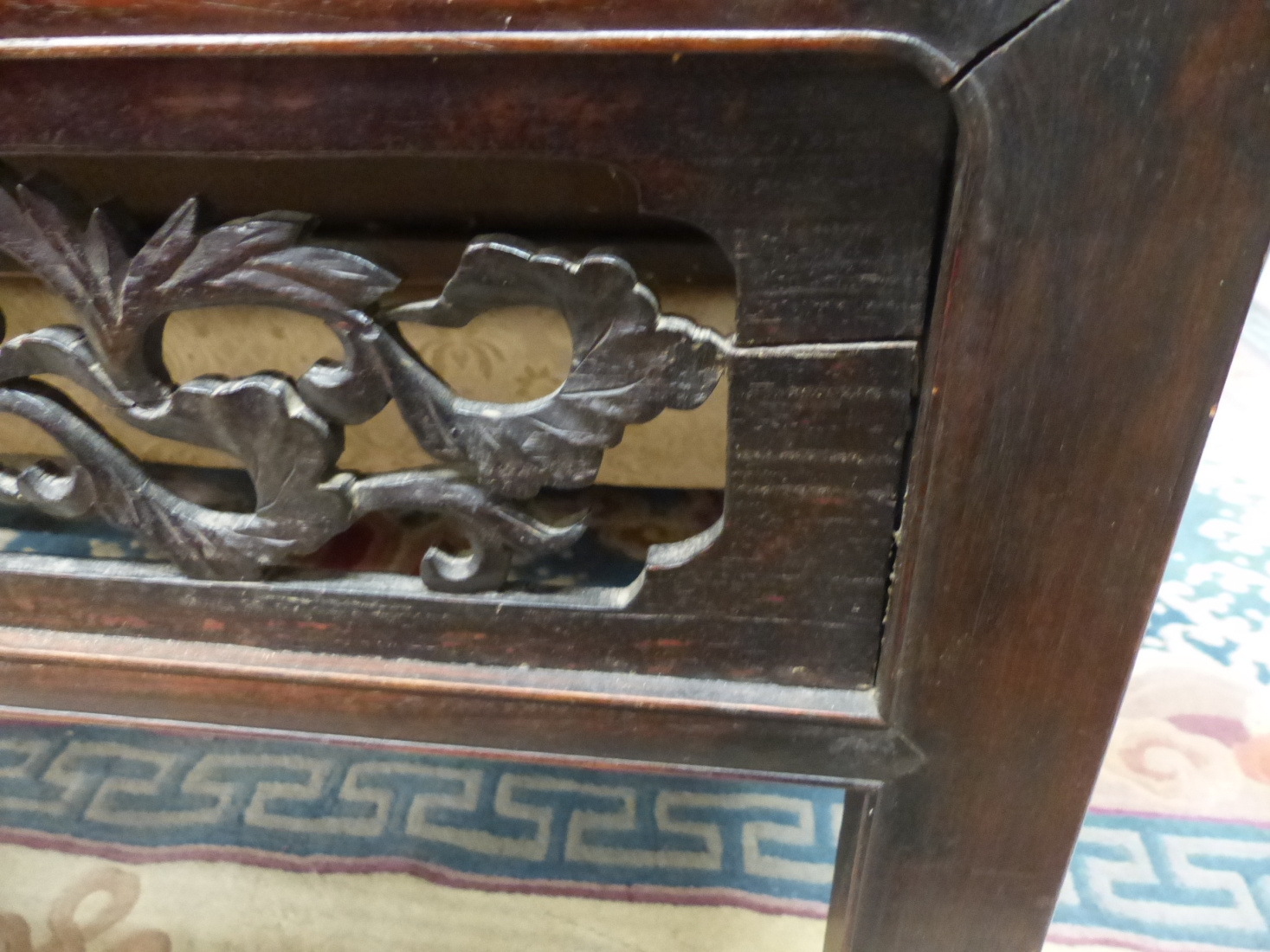 A CHINESE HARDWOOD COFFEE TABLE, THE RECTANGULAR TOP RECESSED ABOVE THE APRON PIERCED AND CARVED - Image 3 of 4