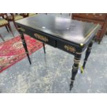 A BLACK LACQUERED TEA TABLE GILT WITH BANDING AND PALMETTES TO THE CORNERS, APRON DRAWER, TURNED