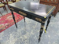 A BLACK LACQUERED TEA TABLE GILT WITH BANDING AND PALMETTES TO THE CORNERS, APRON DRAWER, TURNED