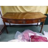 A GEORGIAN MAHOGANY AND LINE INLAID BOW FRONT THREE DRAWER SERVING TABLE ON SHAPED SQUARE TAPERED